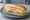Broodje Krab: an illustration of crab, mayonnaise and lettuce on kaiser roll.