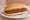 Broodje Mexicano: an illustration of beef, pepper and mustard on kaiser roll.