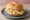 Broodje Nagelkaas: an illustration of cumin and butter on kaiser roll.