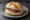 Broodje Nutella: an illustration of chocolate hazelnut spread on kaiser roll.