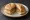 Broodje Pindakaas: an illustration of peanut butter and butter on kaiser roll.