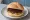 Broodje Pindakaas met Hagelslag: an illustration of peanut butter and butter on kaiser roll.