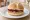 Broodje Pindakaas met Jam: an illustration of peanut butter and jam on kaiser roll.