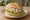 Broodje Tonijn: an illustration of tuna, mayonnaise, onion and lettuce on kaiser roll.