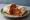 Burrito con Chile Rojo New Mexico: an illustration of pork on tortilla.