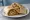 Burrito de Chile Verde: an illustration of pork on tortilla.