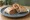 Burrito de Frijoles: an illustration of refried beans on tortilla.