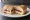 Camembert Sandwich: an illustration of butter on white bread.
