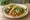 Cantina Taco: an illustration of chicken, beef, cilantro, onion and more on corn tortilla.
