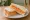Carrot Sandwich: an illustration of carrot, mayonnaise and butter on white bread.