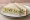 Celery and Stilton: an illustration of celery and butter on white bread.