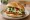 Cemita de Pollo: an illustration of chicken, avocado and onion.