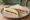 Cheese and Chutney (Tea): an illustration of cheddar cheese, chutney and butter on white bread.
