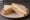 Cheese and Ham: an illustration of ham, cheddar cheese and butter on white bread.