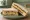 Cheese and Marmite: an illustration of cheddar cheese, marmite and butter on white bread.