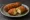 Cheese Bread Roll: an illustration of cheese on white bread.