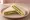 Cheese Chutney Sandwich: an illustration of cheese and butter on white bread.