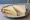 Cheese Spread: an illustration of cheese and butter on white bread.