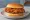 Chick-fil-A Spicy Chicken Sandwich: an illustration of chicken, cayenne, butter and pickle on burger bun.