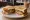 Chicken Cutlet Sandwich: an illustration of chicken, onion and cilantro on white bread.