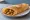 Chicken Dosa: an illustration of chicken, onion, ginger, garlic and more.