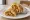 Chicken Egg Roll: an illustration of chicken, egg and onion on naan.