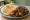 Chicken Fry with Porotta: an illustration of chicken, onion, ginger, garlic and more.