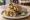 Chicken Kathi Roll: an illustration of chicken, onion and cilantro on naan.