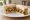 Chicken Tikka Sandwich: an illustration of chicken, chutney, lettuce, tomato and more on white bread.