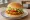 Chickenburger: an illustration of chicken, lettuce, tomato and mayonnaise on burger bun.