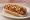 Chihuahua Hot Dog: an illustration of pork, bacon, beans, tomato and more.