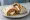 Chile Relleno Burrito: an illustration of cheese, egg, beans and rice on tortilla.