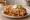 Chimichanga: an illustration of beef, beans, cheese, sour cream and more on tortilla.