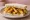 Chip Butty with Curry Sauce: an illustration of butter on white bread.