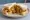 Chip Butty with Curry Sauce: an illustration of butter on white bread.