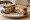 Chopped Liver Sandwich: an illustration of onion, egg and mustard on rye bread.