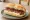 Choripán con Mayonesa: an illustration of pork, sausage and mayonnaise on baguette.