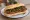 Choripán Mariposa: an illustration of pork, sausage and chimichurri on baguette.