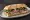 Ciabatta con Roast Beef: an illustration of beef, arugula and mayonnaise on ciabatta.