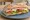 Ciabatta: an illustration of ham, cheese, tomato and lettuce on ciabatta.
