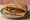 Ciabatta Siciliana: an illustration of anchovy, tomato, olive oil and caper on ciabatta.