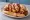 Cleveland Polish Boy: an illustration of kielbasa, potato, coleslaw and bbq sauce on hot dog bun.