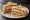 Club Sandwich Mumbai Style: an illustration of chicken, egg, cucumber, tomato and more on white bread.