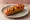 Corn Dog - Japanese (アメリカンドッグ): an illustration of pork, ketchup and mustard.