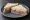 Corned Beef and Onion: an illustration of corned beef, onion and butter on white bread.
