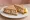 Crab Sandwich: an illustration of crab, lemon and butter.