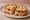 Cramique Garni: an illustration of ham, butter and raisins.