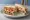 Crayfish Sandwich: an illustration of lettuce on white bread.