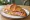 Croissant au Jambon: an illustration of ham and butter on croissant.