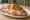 Croissant: an illustration of ham, cheese and butter on croissant.